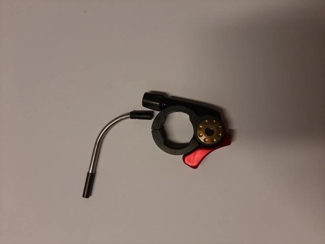 Kindshock lockout hendel for styre 